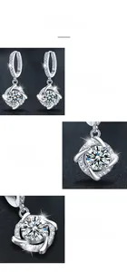 Macro detail of S925 sterling silver moissanite earrings with classic four-prong setting