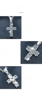Macro detail of moissanite cross pendant with 925 silver four-claw setting and polished finish