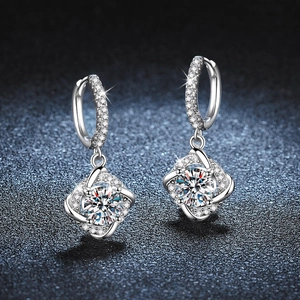 Moissanite windmill drop earrings in 925 sterling silver with a sparkling halo and huggie design