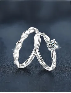 Macro detail of S925 silver twist couple rings with 58 facets moissanite and 3EX cut stone