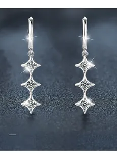 Detail of 925 silver star earrings showing 58 facets and 3EX cut moissanite brilliance