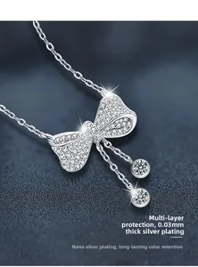 Detail of silver bow pendant with 0.03mm nano-plating for long-lasting shine and durability