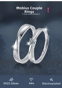 Macro detail of 925 silver Mobius rings featuring a sparkling moissanite solitaire setting