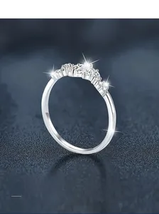 Macro shot of S925 sterling silver crown ring featuring sparkling moissanite stones