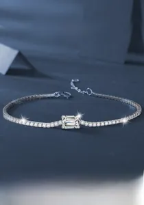 Detail of S925 sterling silver moissanite bracelet with emerald-cut center stone