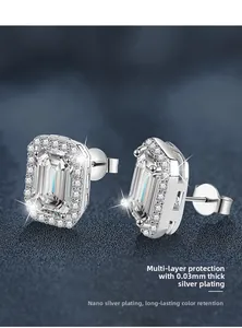 Macro view of rectangular moissanite halo stud earrings with silver plating detail