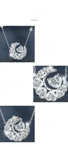 Détail macro du pendentif lune et cœur montrant le serti à griffes et pierres moissanite