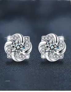 Detail of s925 silver square earrings with 3EX cut moissanite and pave stones
