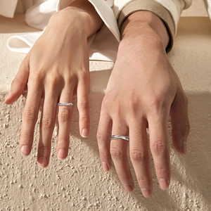 925 silver Mobius rings for couples featuring a minimalist twisted design and moissanite stones
