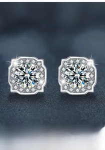 Macro shot of S925 silver moissanite stud earrings featuring square halo design