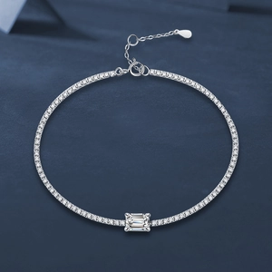 Elegant S925 sterling silver tennis bracelet with emerald cut center stone and extension chain