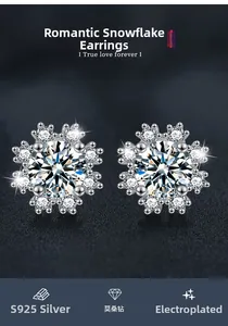 Close-up of S925 sterling silver snowflake stud earrings with sparkling moissanite stones