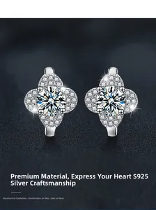 Detail of S925 sterling silver four-leaf clover earrings with pavé set moissanite