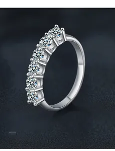 Detail shot of S925 silver ring featuring six brilliant round-cut moissanite stones
