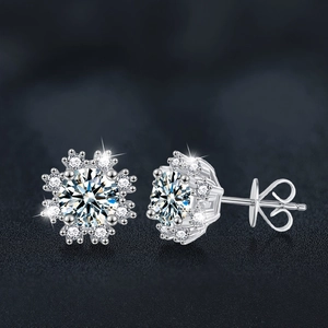 Elegant S925 sterling silver snowflake stud earrings featuring Moissanite center stones