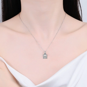Elegant s925 silver necklace with princess cut moissanite pendant on female model