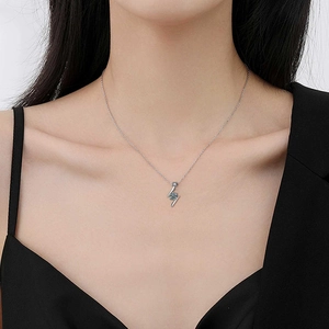 Elegant S925 sterling silver lightning necklace with moissanite pendant on a model