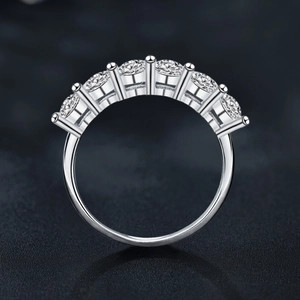 S925 sterling silver ring with seven round-cut moissanite stones in a prong setting