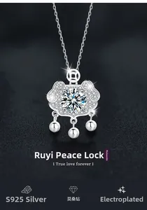 Macro shot of S925 silver Ruyi lock pendant with a sparkling Moissanite diamond