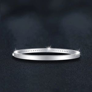 Minimalist S925 sterling silver bangle with pavé-set moissanite stones on black leather