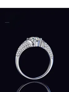 Macro detail of the S925 sterling silver four-claw moissanite ring with shimmering accents