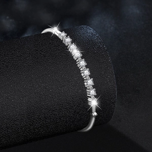 Adjustable S925 sterling silver bangle with elegant row of moissanite diamonds