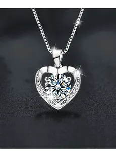 Macro view of S925 silver heart pendant with 3EX cut moissanite and side stones