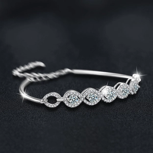 S925 sterling silver moissanite bracelet with adjustable chain on black background