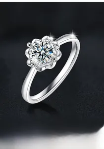 Close-up of S925 sterling silver flower ring with brilliant moissanite center stone