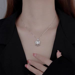 S925 silver Ruyi lock necklace with moissanite and bells worn on a female model