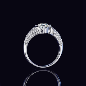 Luxurious S925 sterling silver moissanite ring with four-prong setting and pavé side stones
