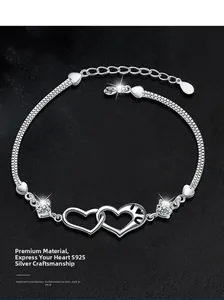 Detailed view of S925 silver double interlocking heart bracelet with zircon stones