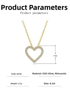 Macro detail of a 14K gold plated heart pendant necklace with shimmering moissanite stones