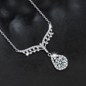 S925 sterling silver angel wing necklace with a sparkling pear-shaped moissanite pendant