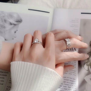 S925 sterling silver couple rings set with Eiffel Tower inspired moissanite stones