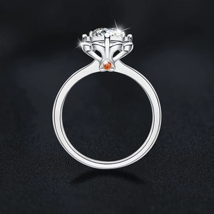 Elegant S925 sterling silver flower ring with a large moissanite and heart detail