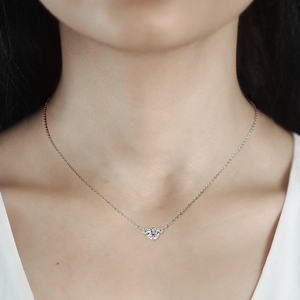 Elegant S925 sterling silver heart necklace with a sparkling round moissanite pendant
