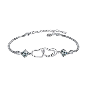 Polished S925 silver double heart bracelet with clear round-cut cubic zirconia stones