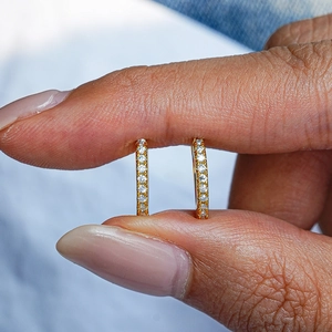 Classic 18K gold plated S925 silver huggie earrings with round moissanite stones
