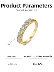 Macro detail of S925 sterling silver ring with seven round moissanite stones and gold finish
