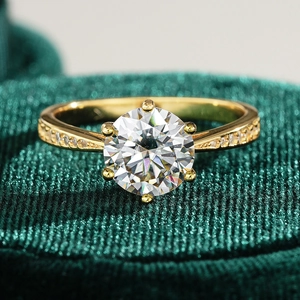 Classic six-prong 8mm round moissanite ring set in 925 silver with a gold finish