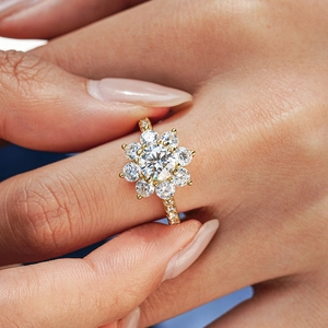 Sunflower moissanite ring in 18K gold plated S925 silver worn by a model