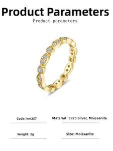 Detailed view of wave-shaped S925 silver ring with 18K gold plating and moissanite