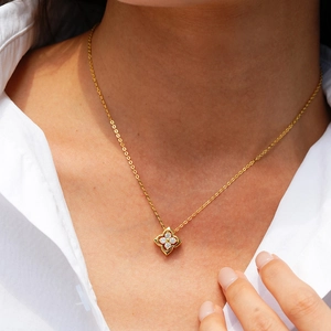 14K gold plated sterling silver necklace with a four-leaf clover moissanite pendant