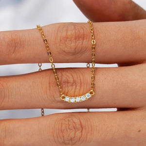 14K gold plated 925 silver necklace with curved smile pendant and five round moissanite stones