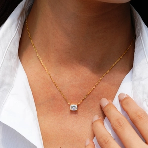 Rectangle emerald-cut moissanite necklace in 14K gold-plated 925 silver on model