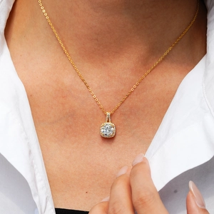 Classic square halo pendant necklace in 14K gold plated silver worn by a female model
