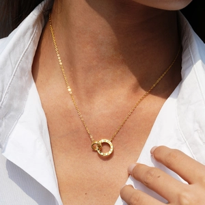 14K gold plated silver necklace featuring Roman numeral disc and pave moissanite rings