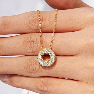 14K gold plated 925 sterling silver necklace with a round pavé moissanite star pendant