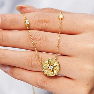 Handheld 14K gold plated 925 silver necklace featuring a sparkling hexagram star pendant